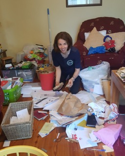 Anne Marie Kingston of White Sage Decluttering, Clonakilty decluttering a client's home.